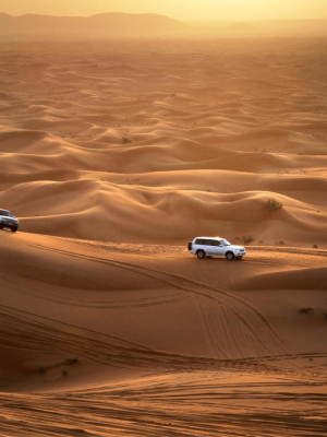 Shop Online Abu Dhabi Sunset Desert Safari with BBQ, Camel Ride & Sandboarding – Experiences Dubai Masala